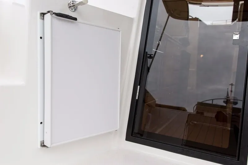 Slide: The Image of 2021 Ranger Tugs R-27 LE - Cockpit storage - 14