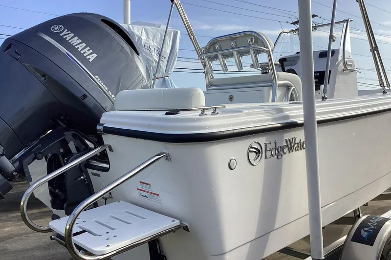Slide: The Image of 2023 Edgewater 188CC boat with Yamaha outboard motor. - 11