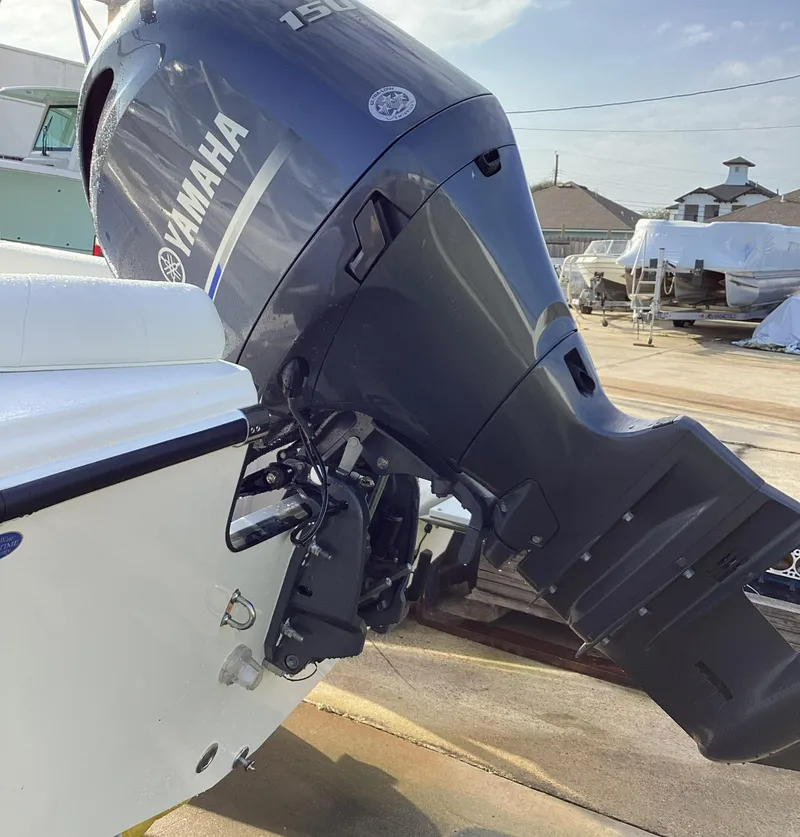 Slide: The Image of 2023 Edgewater 188CC boat with Yamaha 150 outboard motor. - 12