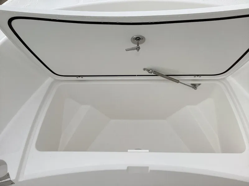 Slide: The Image of 2023 Edgewater 188CC boat storage compartment with open hatch. - 7
