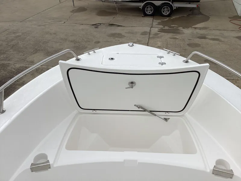 Slide: The Image of 2023 Edgewater 188CC boat with open storage compartment on deck. - 8
