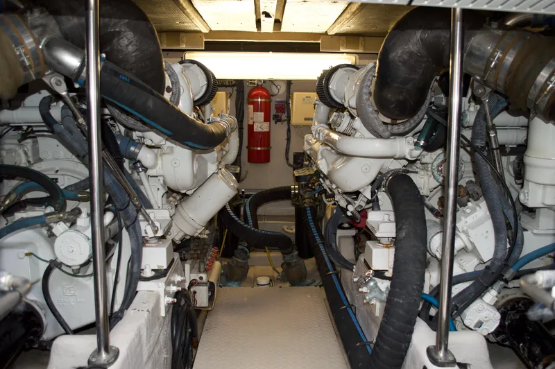 Slide: The Image of Engine room of a 2005 Sea Ray 550 Sedan Bridge yacht with twin engines. - 19