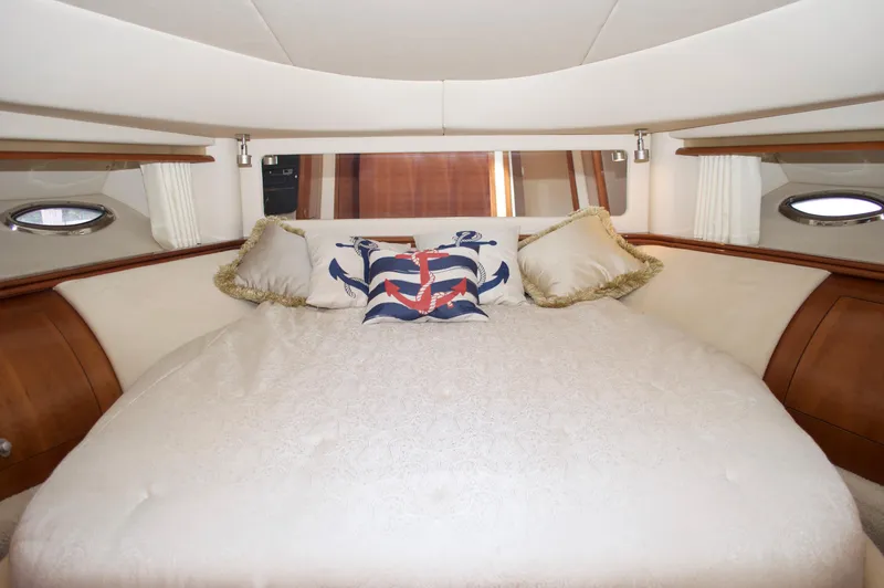 Slide: The Image of Luxurious bedroom interior of 2005 Sea Ray 550 Sedan Bridge yacht. - 7