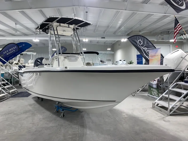 Slide: The Image of 2024 Key West 203 FS boat on display in showroom. - 2