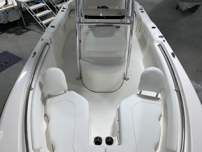 Slide: The Image of 2024 Key West 203 FS boat interior with white seating and center console. - 4