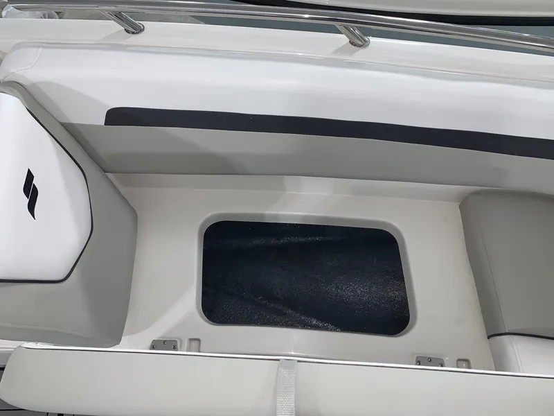 Slide: The Image of 2024 Starcraft SVX 211 boat interior storage compartment. - 17