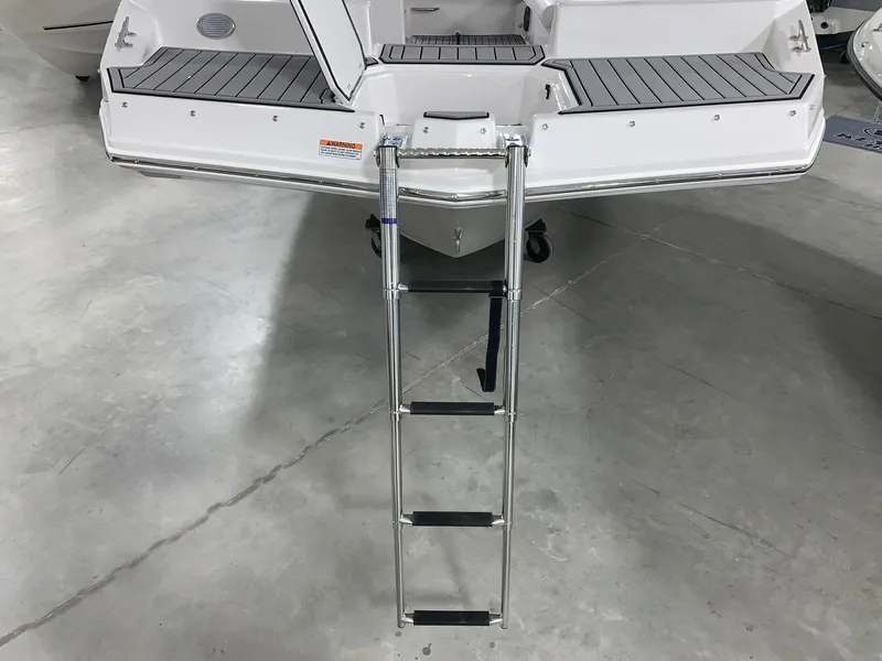 Slide: The Image of 2024 Starcraft SVX 211 boat with extended swim platform and ladder. - 4