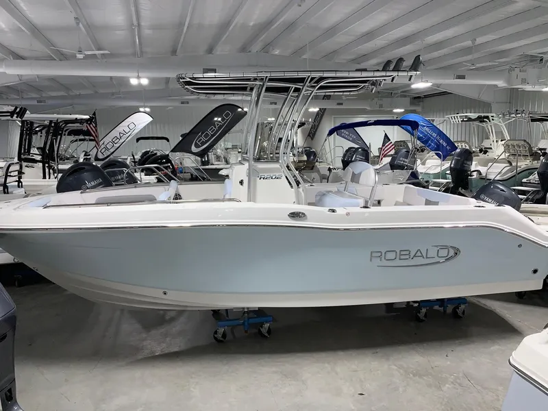 The Image of 2024 Robalo R202 Explorer boat in showroom, side view. - 1