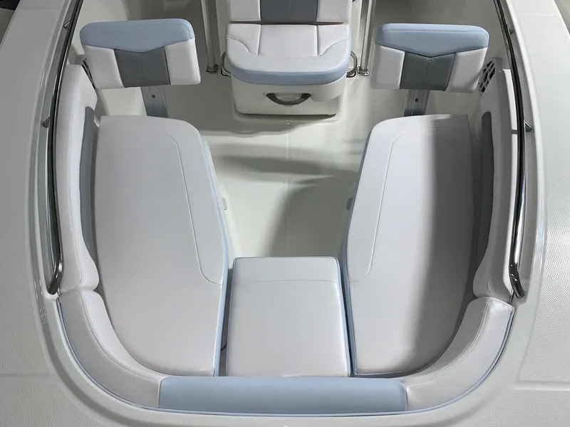 Slide: The Image of 2024 Robalo R202 Explorer boat interior seating area. - 4