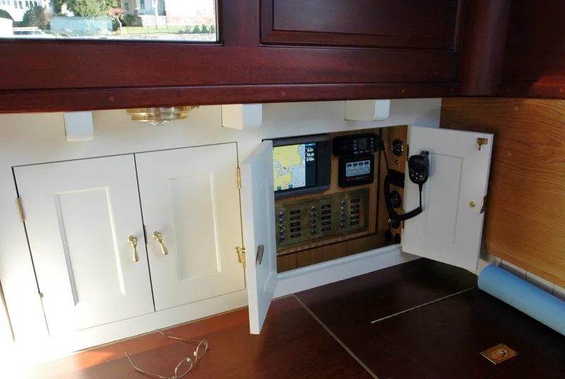 Slide: The Image of Navigation equipment inside a 1902 Herreshoff Gaff Cutter's cabin. - 28