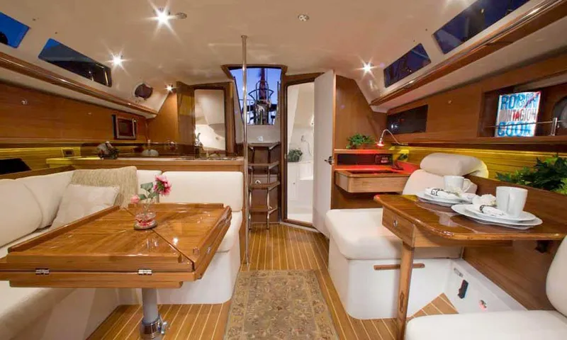 Slide: The Image of Luxurious interior of 2025 Catalina 356 yacht with elegant wood finishes and cozy seating. - 9