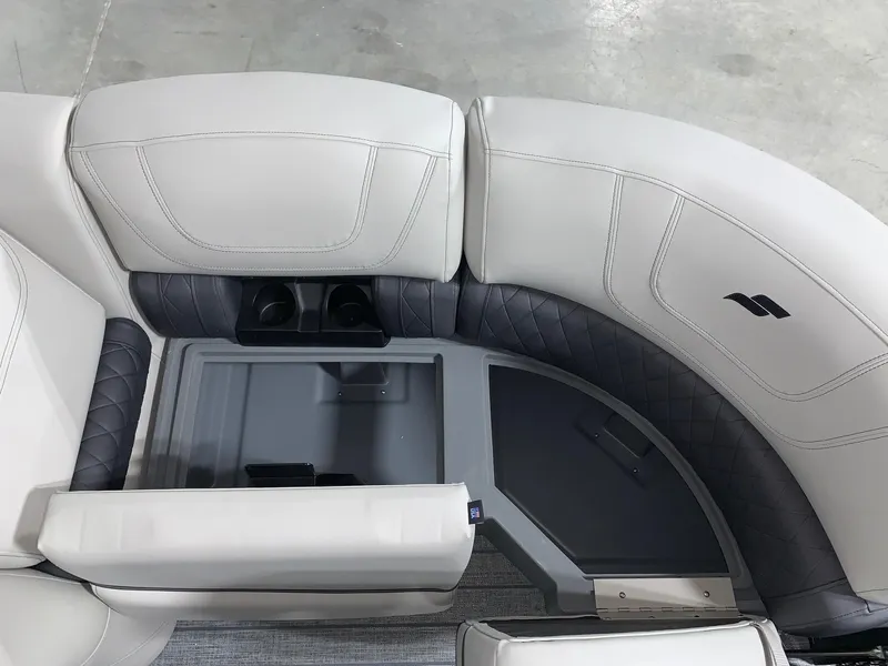 Slide: The Image of 2024 Starcraft SLS 3 Q DH boat interior seating with cup holders. - 10