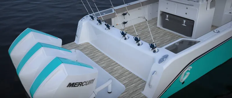 Slide: The Image of 2024 CG Boat Works 34 Tournament with Mercury engines, featuring fishing rod holders. - 46