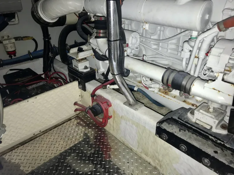 Slide: The Image of Engine room of a 1993 Gamefisherman 34 Express boat with visible components. - 9