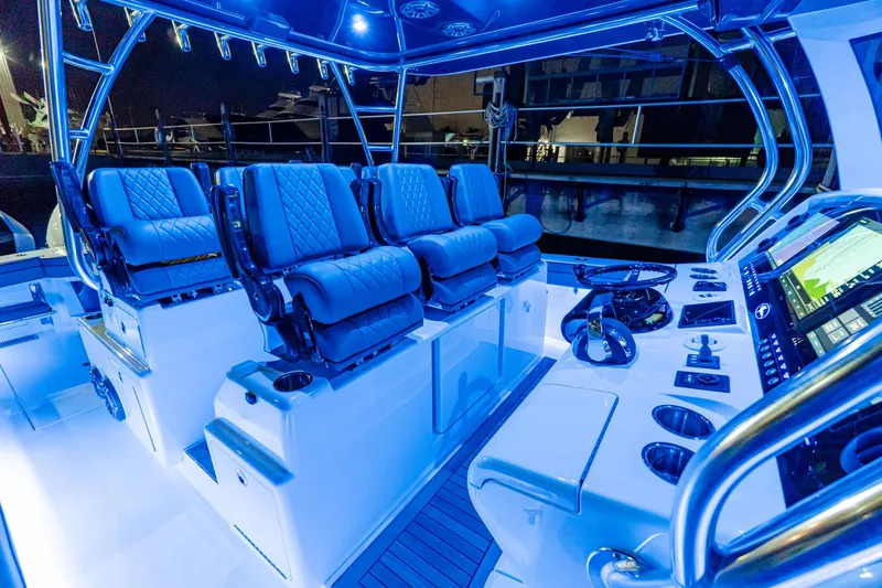 Slide: The Image of 2025 Valhalla Boatworks V-46 cockpit with illuminated seating and advanced navigation system. - 16