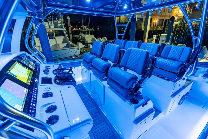 Slide: The Image of Interior of 2025 Valhalla Boatworks V-46 with illuminated seating and advanced navigation system. - 17