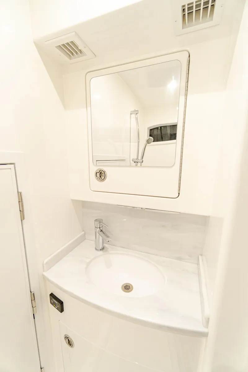 Slide: The Image of 2025 Valhalla Boatworks V-46 bathroom sink and mirror. - 19
