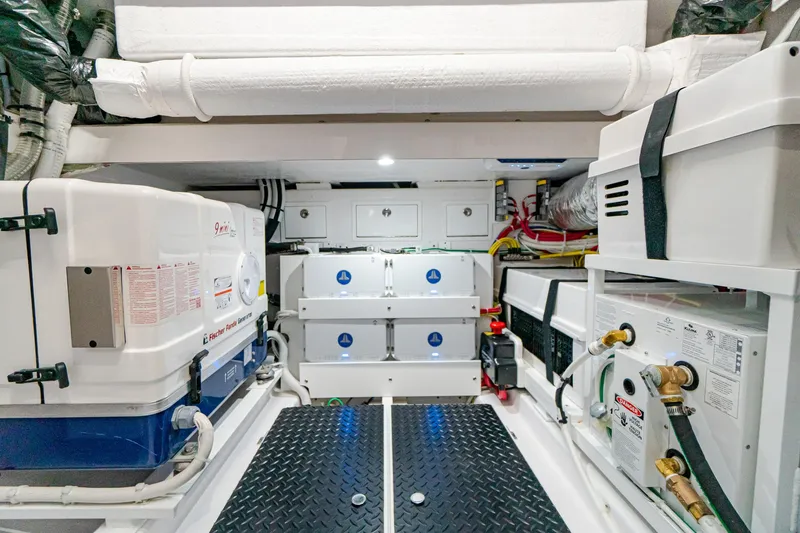 Slide: The Image of Engine room of 2025 Valhalla Boatworks V-46 with advanced equipment and storage. - 20