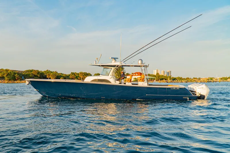 Slide: The Image of 2025 Valhalla Boatworks V-46 on calm water, side view. - 3