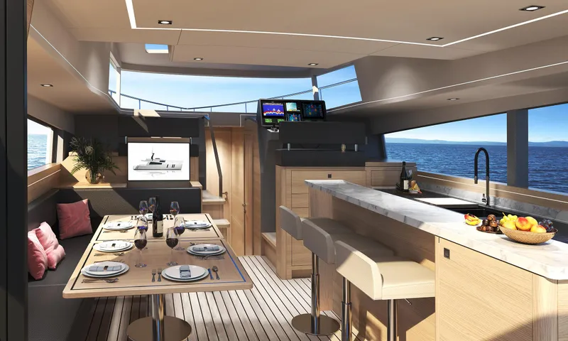 Slide: The Image of Luxurious interior of 2022 Compact Mega Yachts CMY 161 with elegant dining and kitchen area. - 10