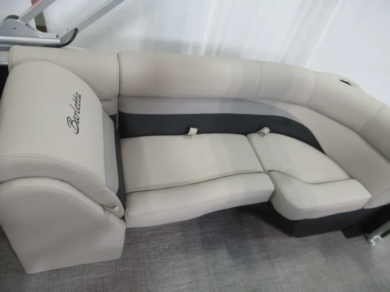 Slide: The Image of 2023 Barletta C22QC boat seating, beige and gray upholstery, comfortable and stylish design. - 10