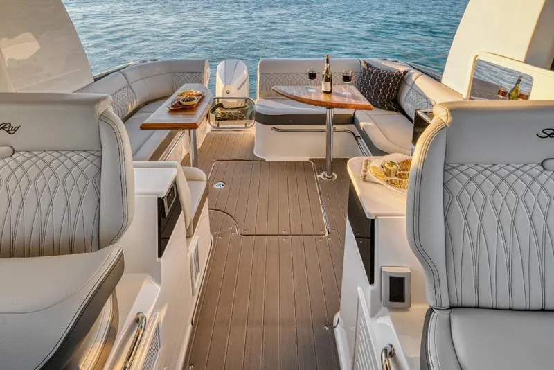 Slide: The Image of Luxurious 2023 Sea Ray Sundancer 370 Outboard boat interior with elegant seating and dining area. - 24