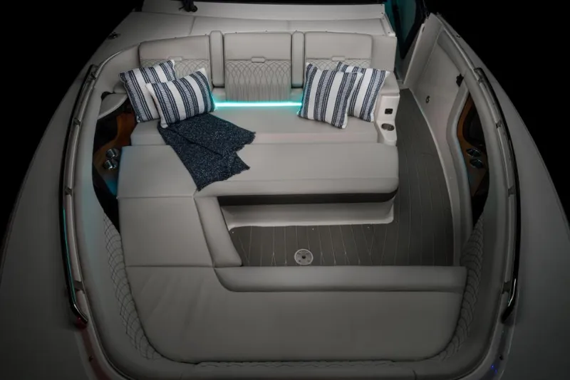 Slide: The Image of Luxurious seating area on 2023 Sea Ray Sundancer 370 Outboard with cushions and ambient lighting. - 38
