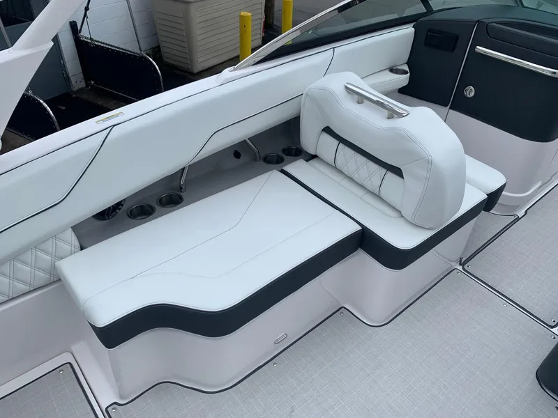 Slide: The Image of 2026 Regal LX4 boat interior with luxurious white seating and modern design. - 11