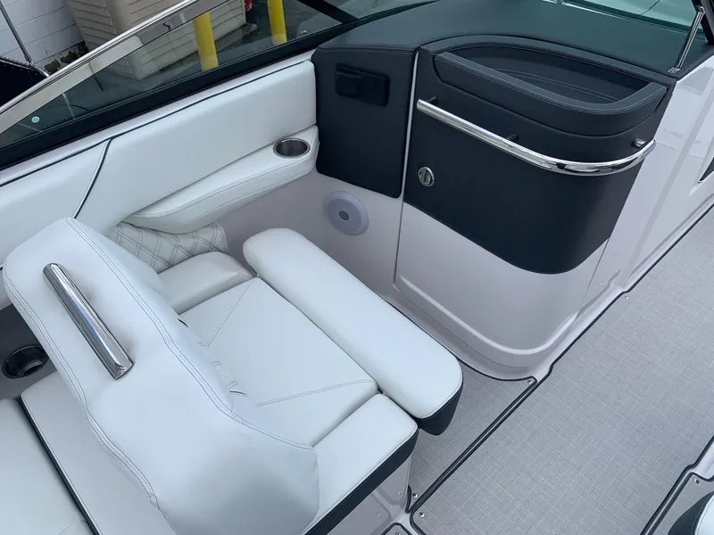 Slide: The Image of Open storage compartment in 2026 Regal LX4 boat, showcasing interior details. - 16