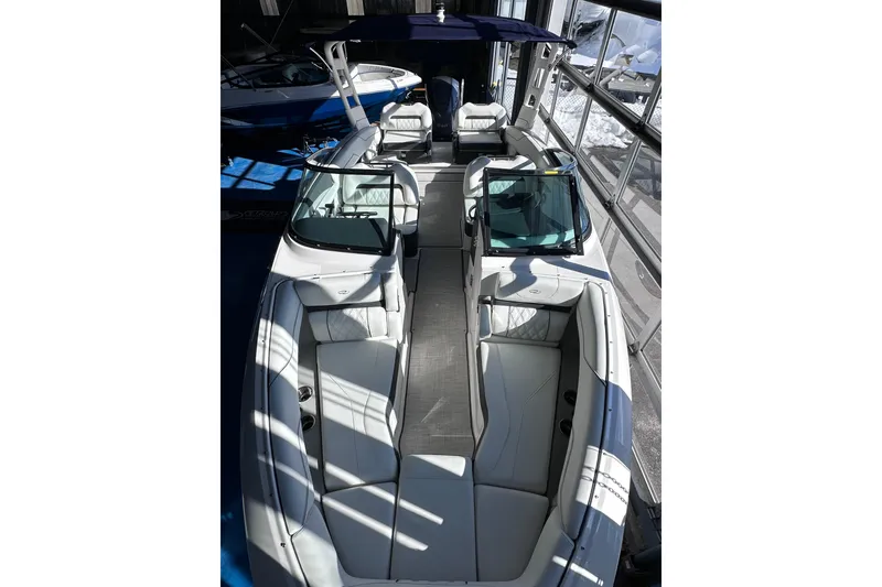 Slide: The Image of 2026 Regal LX4 boat interior with luxurious seating and modern design. - 32