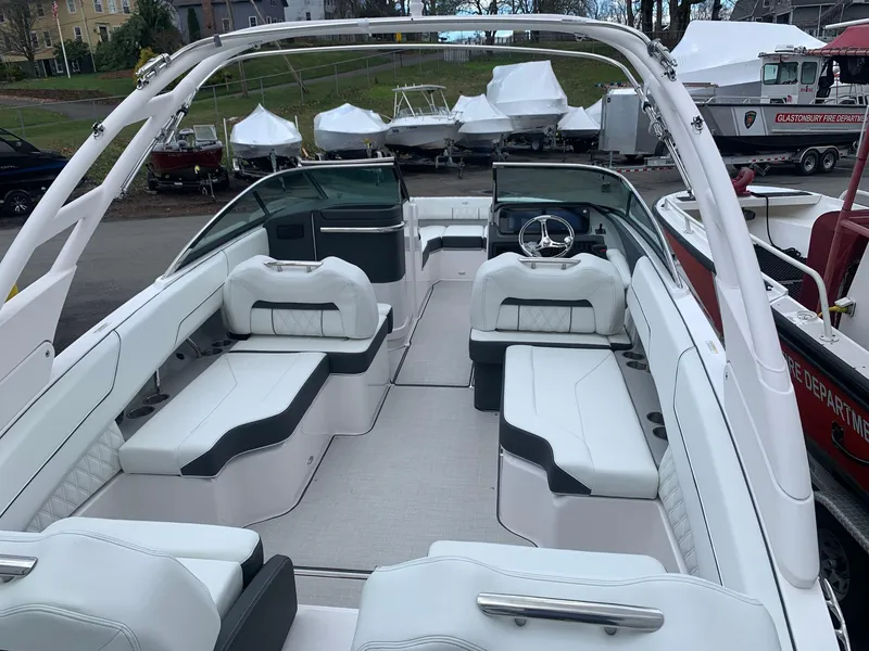 Slide: The Image of Luxurious interior of 2026 Regal LX4 boat with plush seating and modern design. - 7