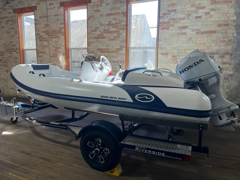 Slide: The Image of 2023 Walker Bay Generation 400 boat with Honda engine on Riverside trailer. - 0
