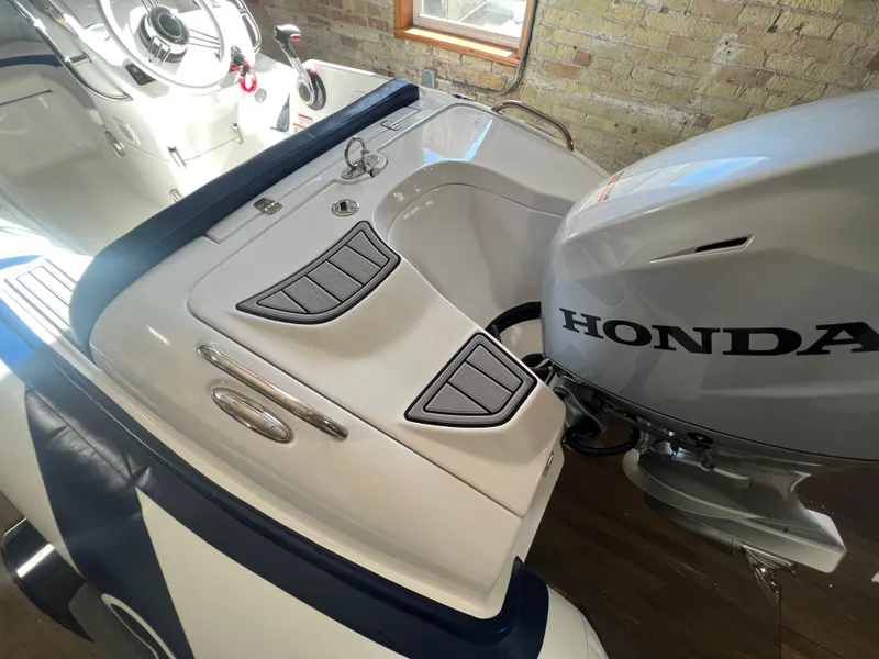 Slide: The Image of 2023 Walker Bay Generation 400 boat with Honda outboard motor. - 4