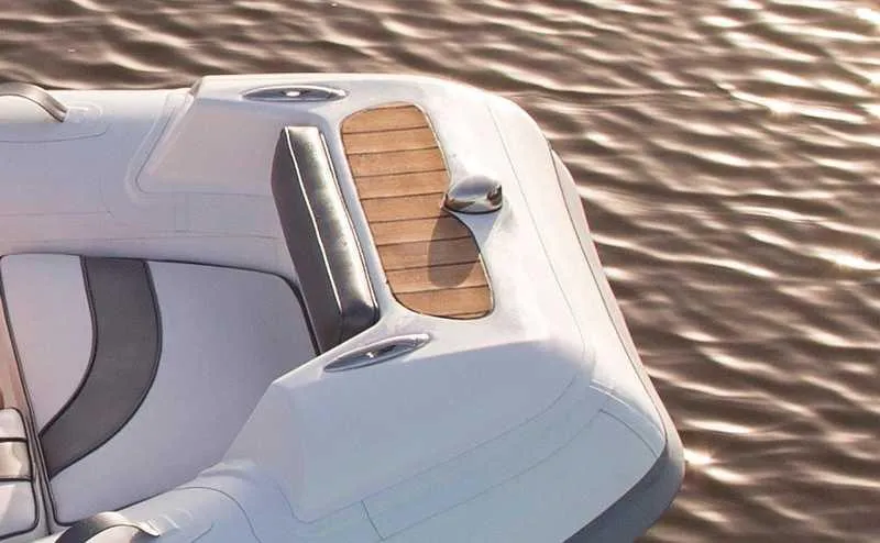 Slide: The Image of Walker Bay Generation 400 boat, 2023 model, on calm water surface. - 5