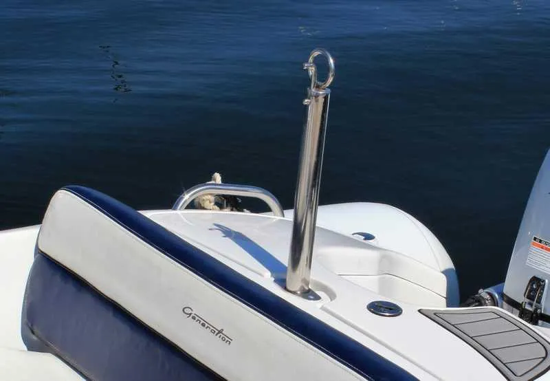Slide: The Image of Walker Bay Generation 400 boat detail, 2023 model, on calm water. - 6