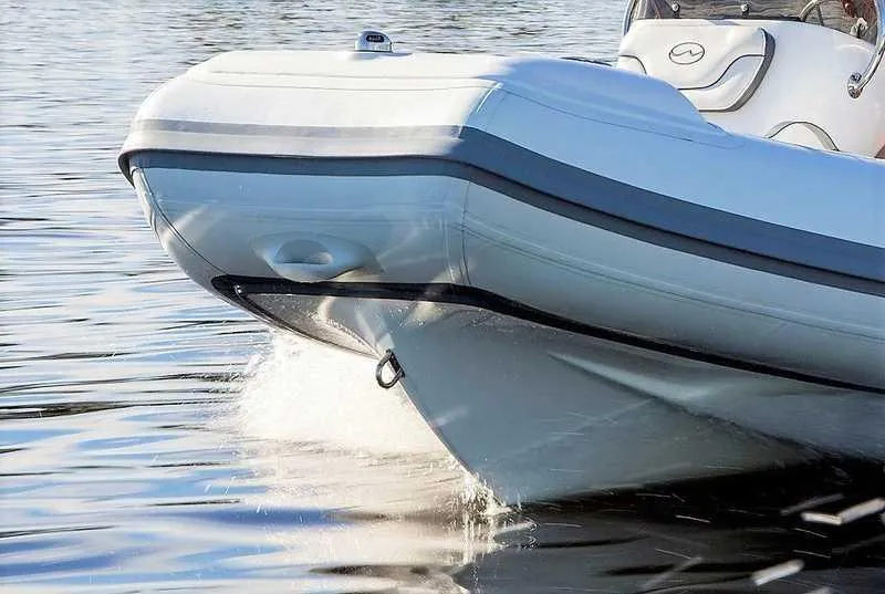 Slide: The Image of Walker Bay Generation 400 boat cruising on water, 2023 model. - 7