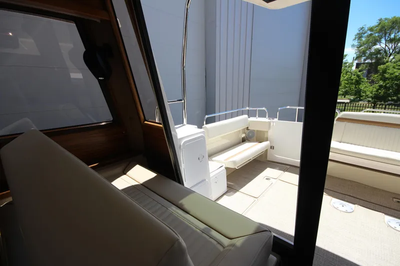 Slide: The Image of Interior view of 2026 Ranger Tugs R-29 S boat with seating area. - 17