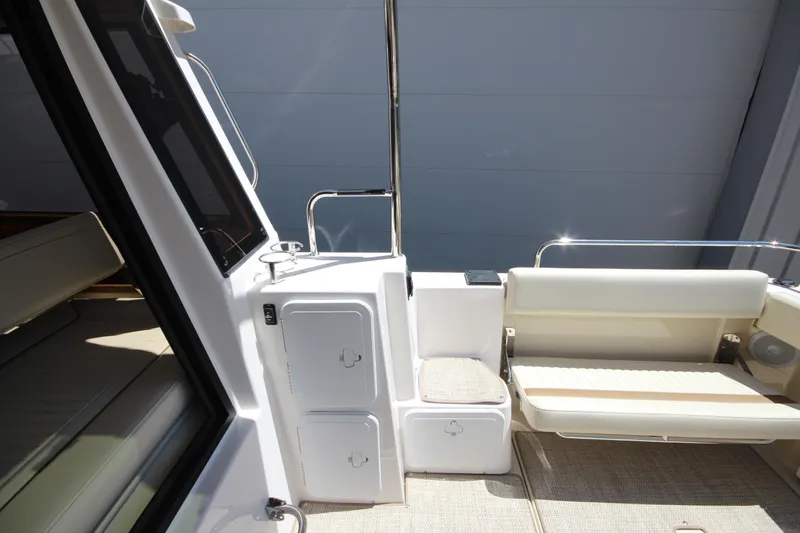 Slide: The Image of 2026 Ranger Tugs R-29 S boat interior with seating and storage compartments. - 18