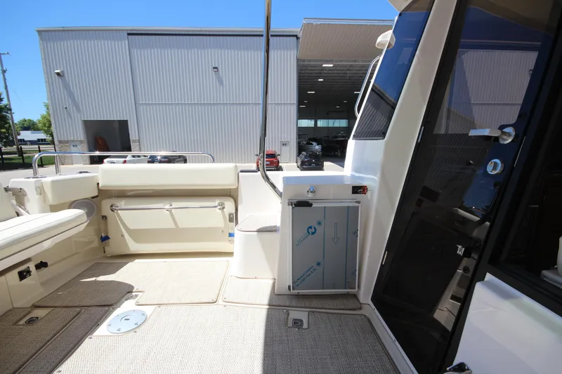 Slide: The Image of 2026 Ranger Tugs R-29 S boat interior with seating and storage. - 19