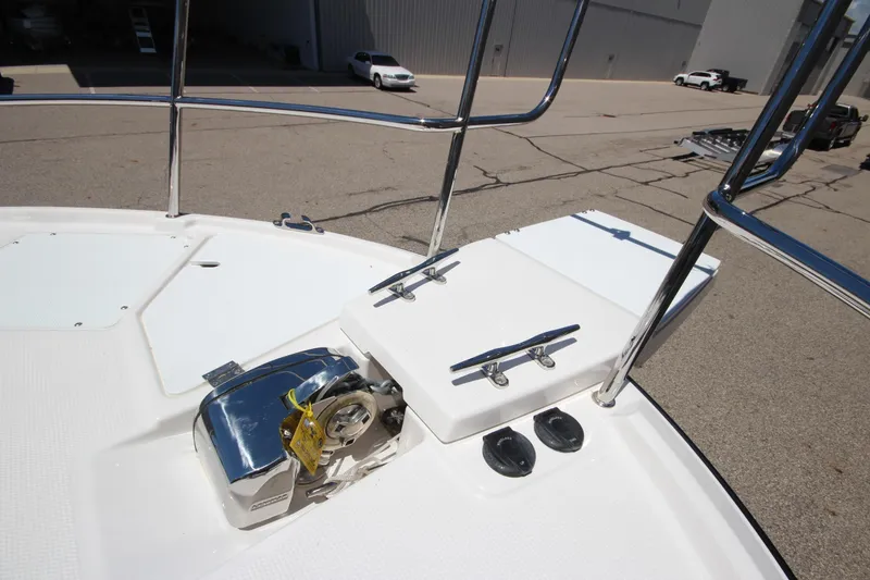 Slide: The Image of 2026 Ranger Tugs R-29 S boat deck with anchor winch and cleats. - 50