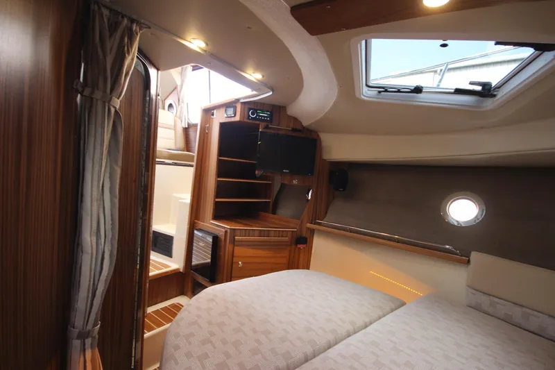 Slide: The Image of Luxurious interior of 2025 Ranger Tugs R-29 Command Bridge yacht cabin. - 45