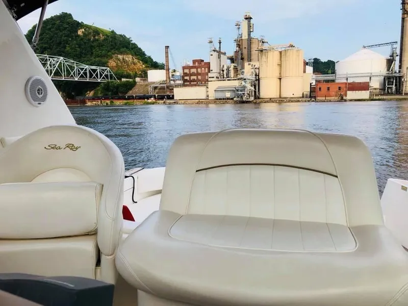 Slide: The Image of Sea Ray Sundancer 310 boat with industrial backdrop, year 2000. - 8