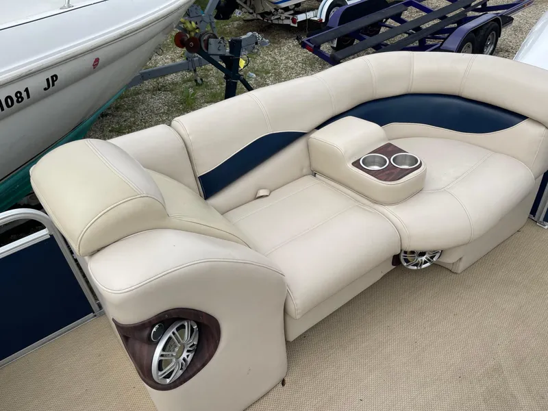 Slide: The Image of 2015 AquaPatio 240EL3 Triple boat seating with cup holders and speaker system. - 7