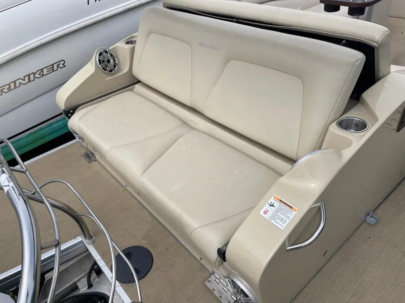 Slide: The Image of 2015 AquaPatio 240EL3 Triple boat seating with cup holders and speakers. - 9