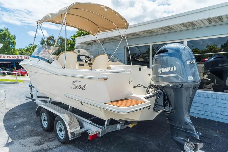 Slide: The Image of 2026 Scout 215 Dorado boat with Yamaha engine on trailer. - 11