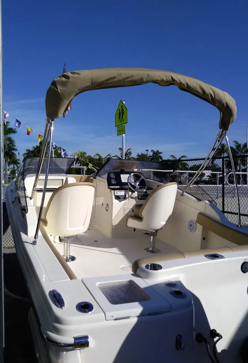 Slide: The Image of Scout 215 Dorado 2026 boat with canopy and helm station. - 3