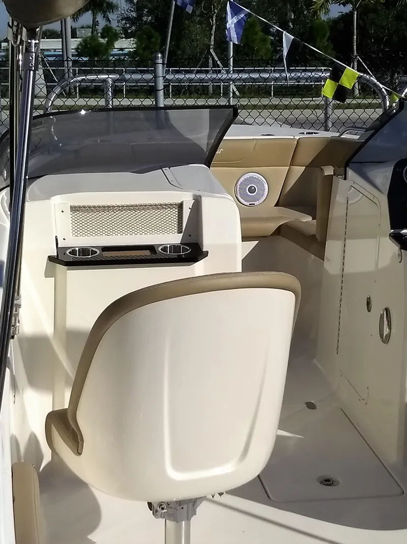 Slide: The Image of Interior of 2026 Scout 215 Dorado with seat and console. - 8