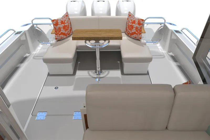 Slide: The Image of Luxurious 2027 Back Cove 39O boat interior with cushioned seating and decorative pillows. - 5
