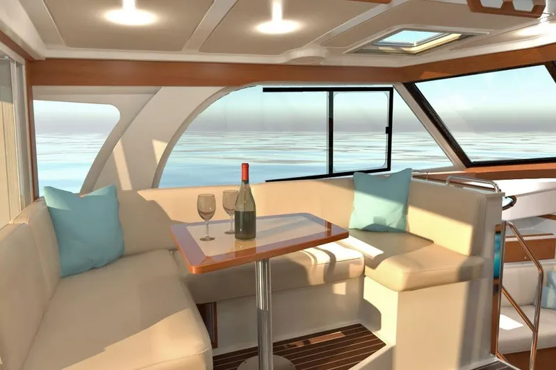 Slide: The Image of Luxurious interior of 2027 Back Cove 39O yacht with elegant seating and ocean view. - 8