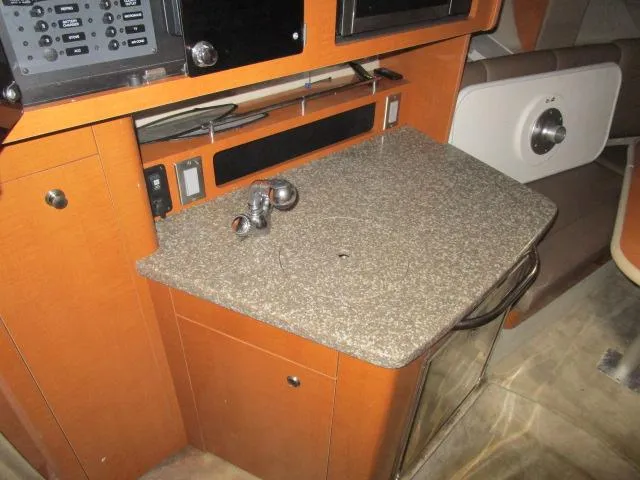 Slide: The Image of Chaparral 270 Signature 2010 interior with countertop and control panel. - 12